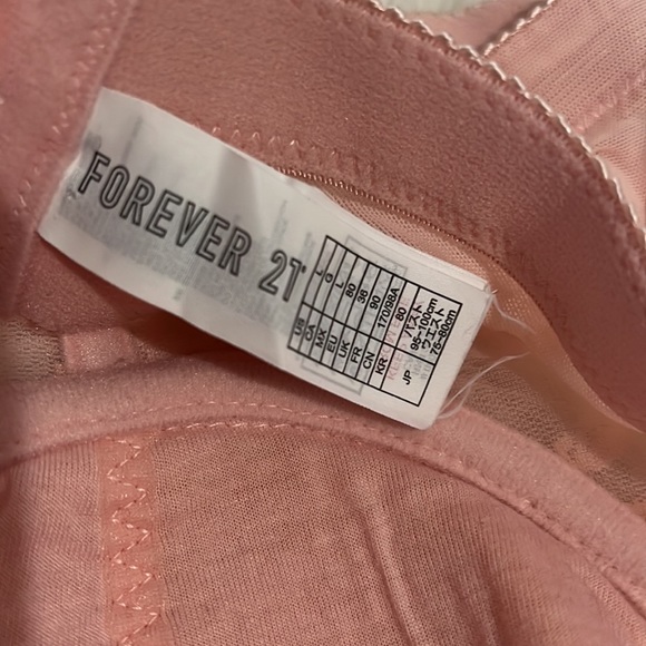 BUSTIER size L us, I think it's more a size S/M, brand FOREVER 21, color pink. - Picture 3 of 3